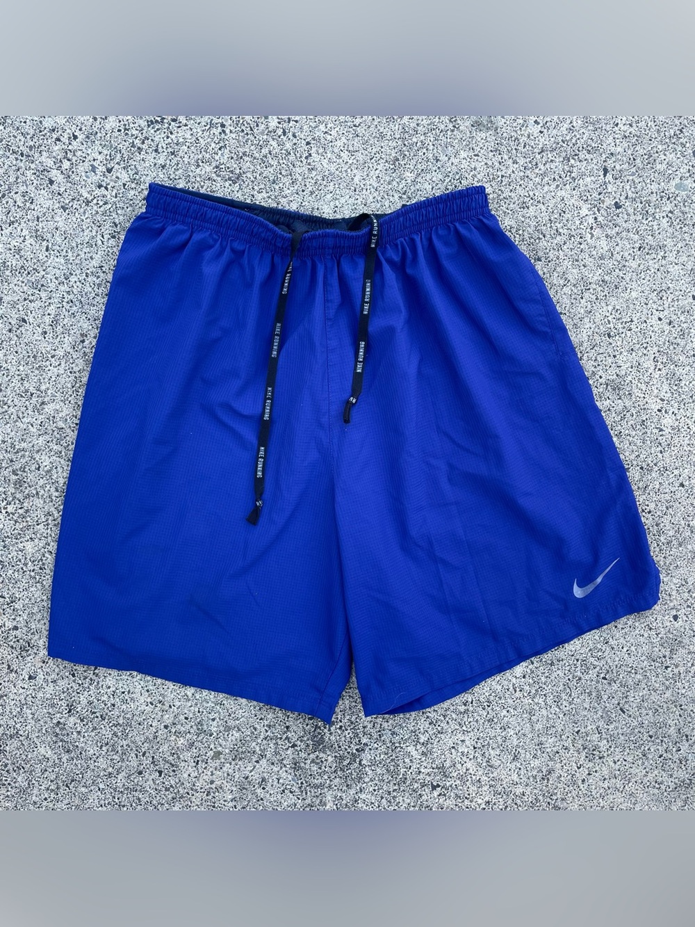 blue/purple Nike Dri-fit running shorts